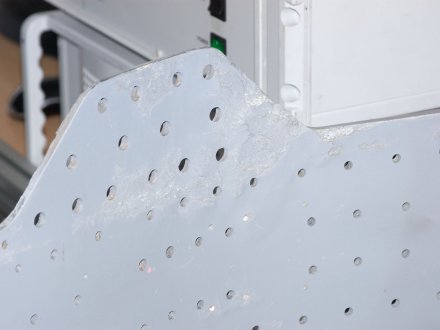 Hole determination on corroded spar end cap